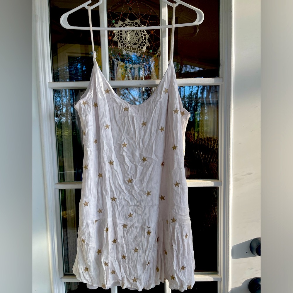 White guaze tunic with stars. Boutique